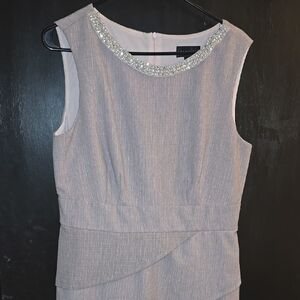 Elegant Gray Sleeveless Dress with Embellished Neckline